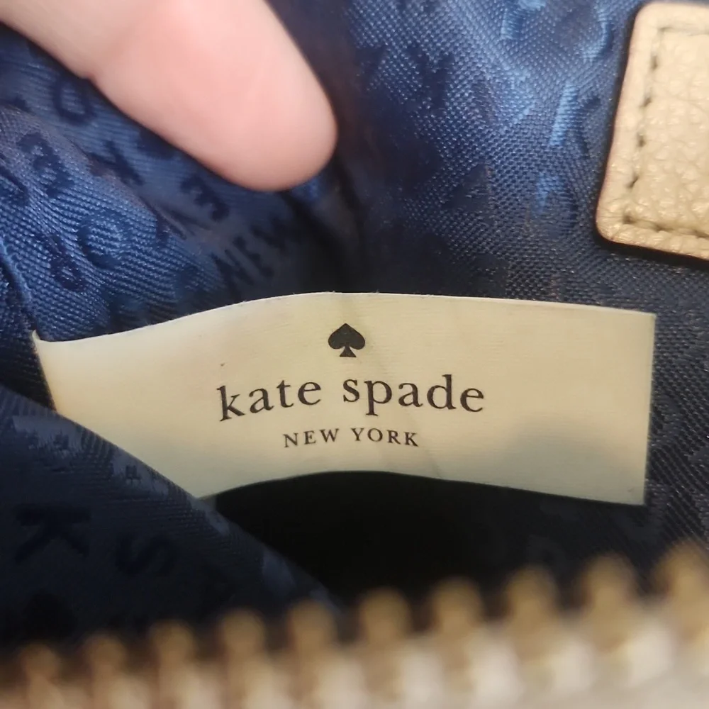 Kate Spade Leather Cream Wristlet with Navy Blue Interior‎